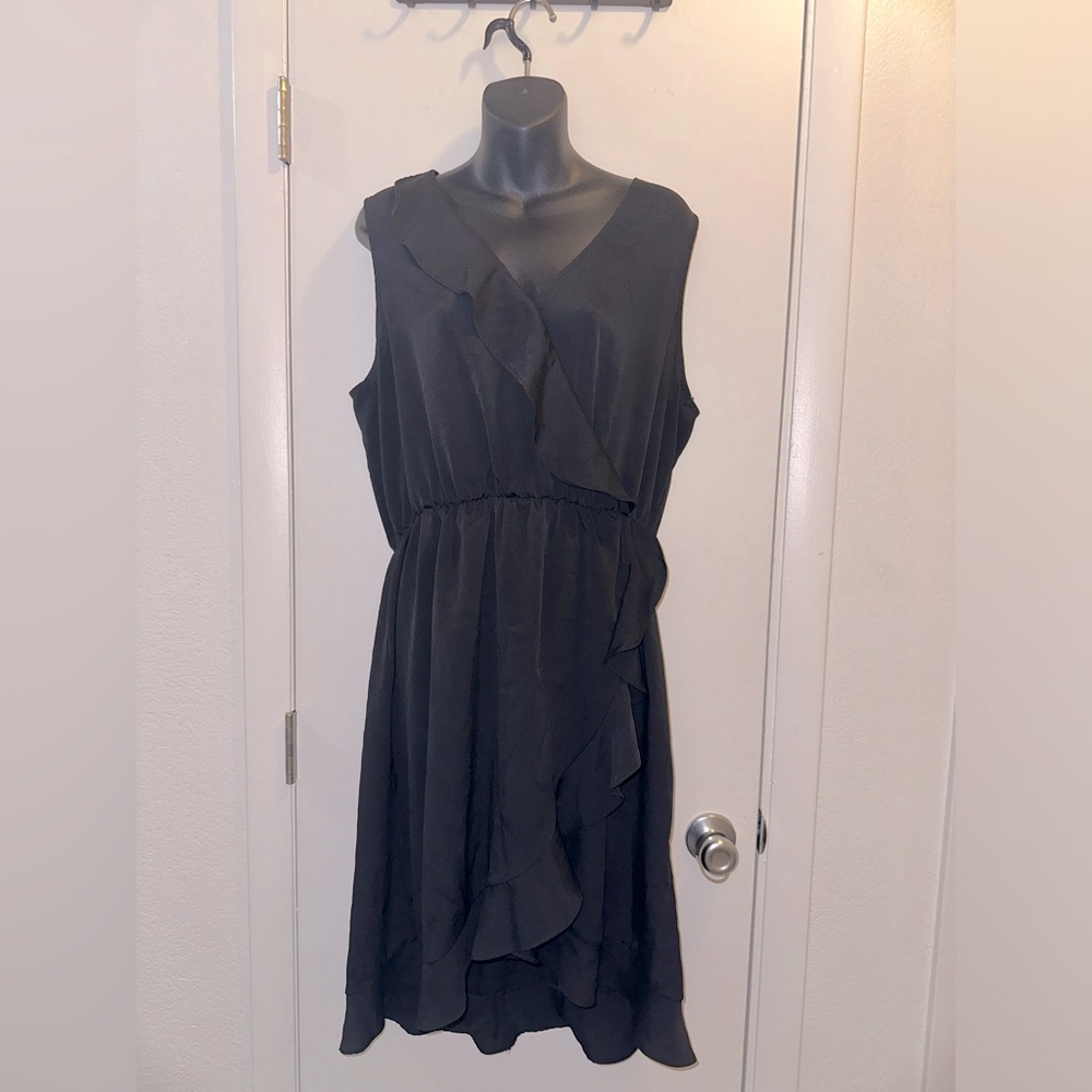 Super cute flattering ruffle knee length dress!